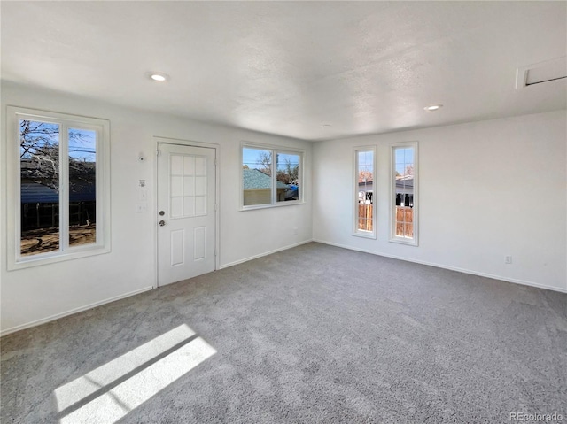 interior space with recessed lighting, carpet, and baseboards