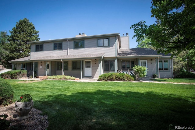 view of front of property featuring a porch and a front lawn