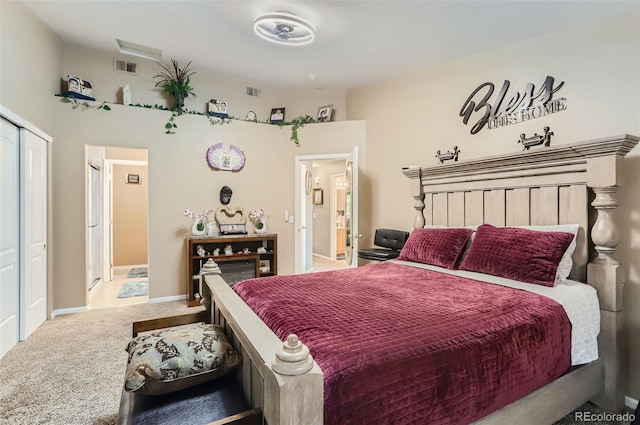 carpeted bedroom with a closet