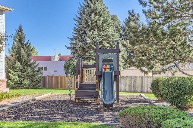 view of play area with a yard