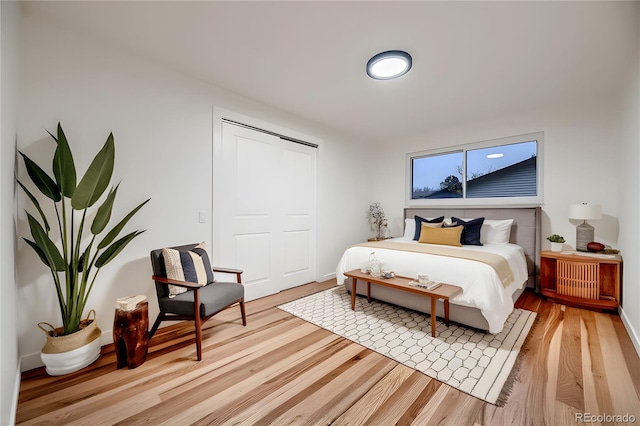 bedroom with light hardwood / wood-style floors