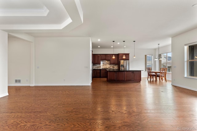 living room with dark wood-type flooring and sink