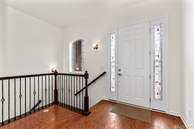 entryway with wood-type flooring and plenty of natural light