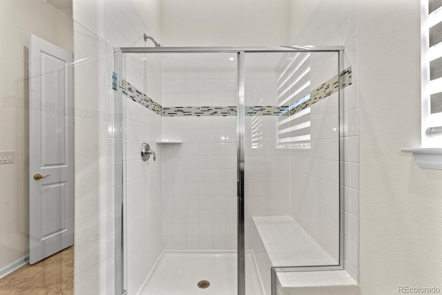 bathroom with walk in shower