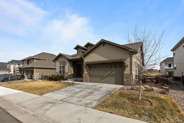 view of front of home featuring a garage and a front lawn