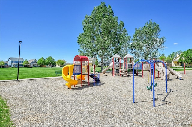 2791 Quarterland St, Strasburg, CO 80136 - community jungle gym with a lawn