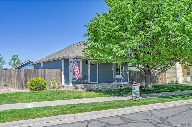 2791 Quarterland St, Strasburg, CO 80136 - view of front of house with roof with shingles and covered porch