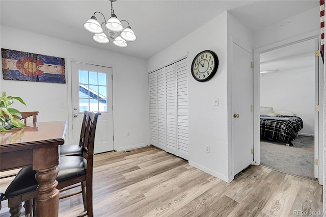 2791 Quarterland St, Strasburg, CO 80136 - office with a chandelier, light wood finished floors, and baseboards