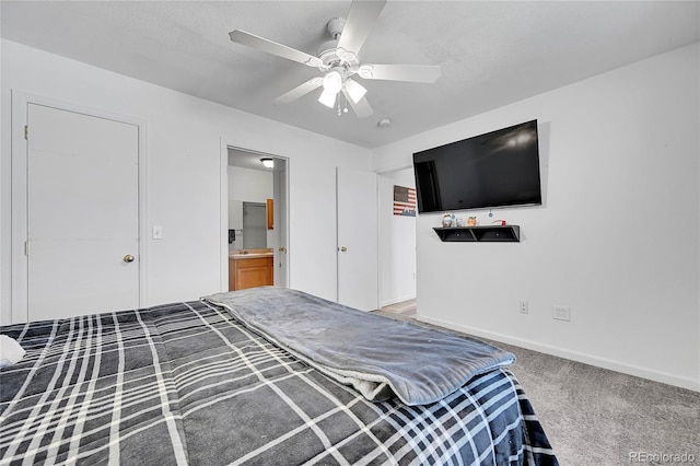 2791 Quarterland St, Strasburg, CO 80136 - bedroom featuring carpet flooring, a ceiling fan, connected bathroom, and baseboards