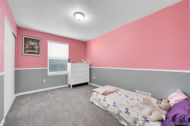2791 Quarterland St, Strasburg, CO 80136 - carpeted bedroom with a textured ceiling and baseboards