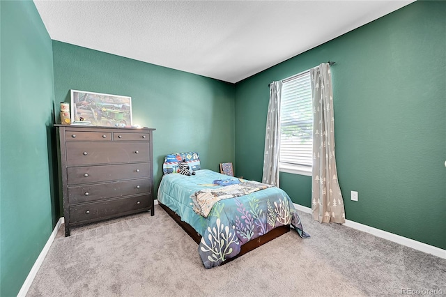 2791 Quarterland St, Strasburg, CO 80136 - bedroom featuring carpet flooring and baseboards