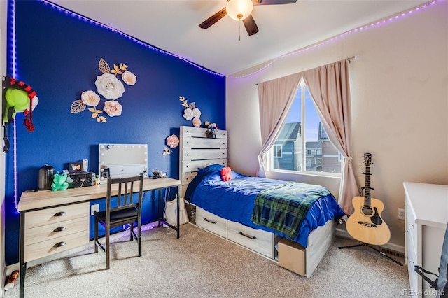 bedroom with ceiling fan and carpet flooring