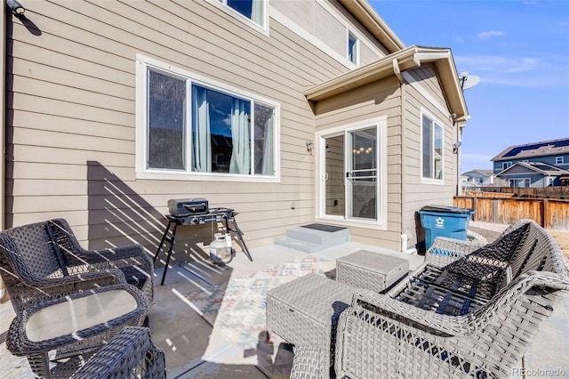 view of patio / terrace with outdoor lounge area and fence