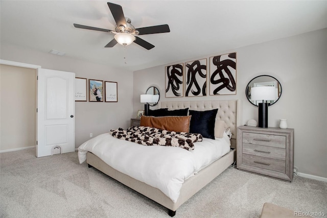 bedroom featuring light carpet and ceiling fan