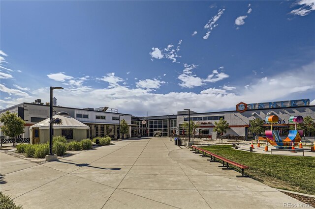 view of property's community featuring playground community