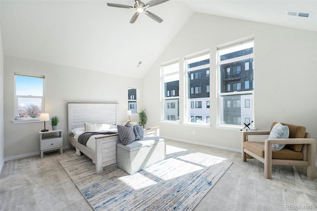 bedroom with visible vents, baseboards, high vaulted ceiling, and carpet flooring