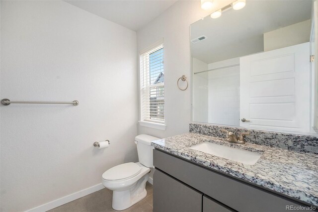 full bath featuring visible vents, toilet, tile patterned flooring, baseboards, and vanity