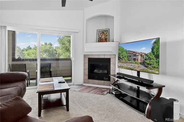 4875 S Balsam Way Unit 8-203, Littleton, CO 80123 - living area with a fireplace, carpet, and a ceiling fan