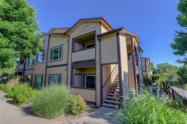 4875 S Balsam Way Unit 8-203, Littleton, CO 80123 - view of property featuring stairway