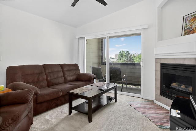 4875 S Balsam Way Unit 8-203, Littleton, CO 80123 - carpeted living area featuring lofted ceiling, a ceiling fan, and a tile fireplace