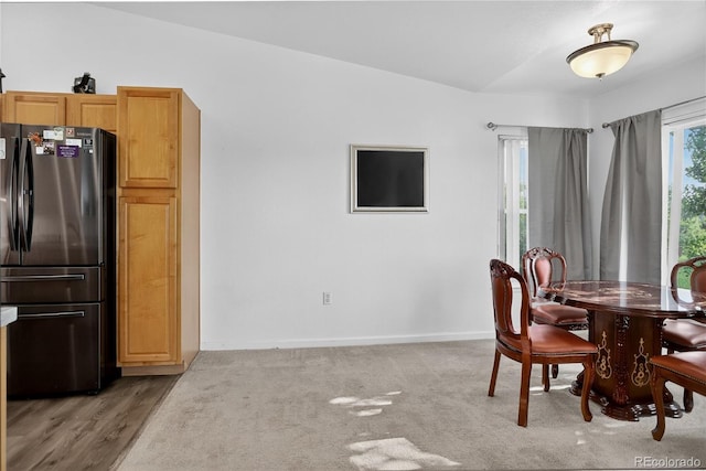 4875 S Balsam Way Unit 8-203, Littleton, CO 80123 - dining room featuring baseboards
