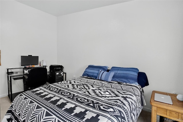 4875 S Balsam Way Unit 8-203, Littleton, CO 80123 - bedroom featuring carpet flooring and baseboards