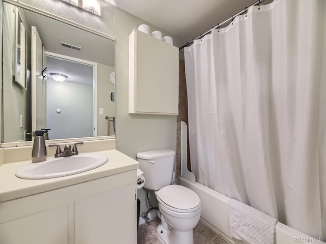 full bathroom with shower / bath combo with shower curtain, toilet, and vanity