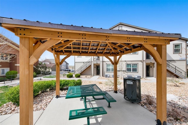 view of patio with a gazebo, stairs, and cooling unit