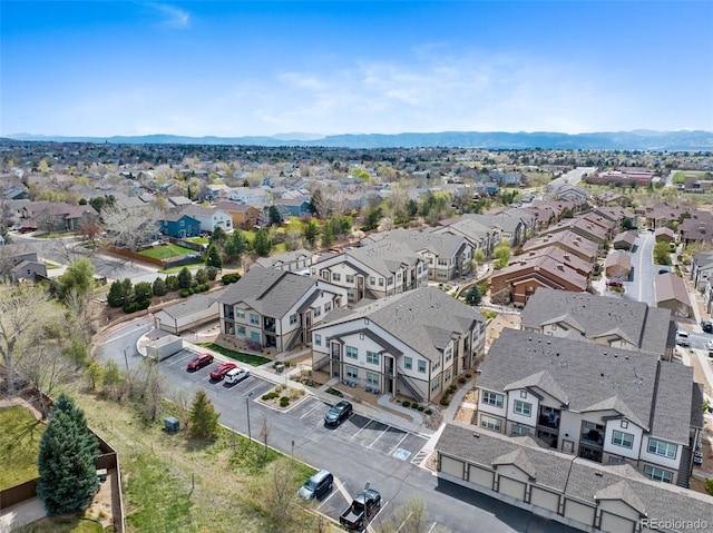 bird's eye view featuring a residential view and a mountain view