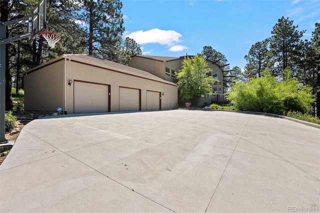 view of property exterior with a garage