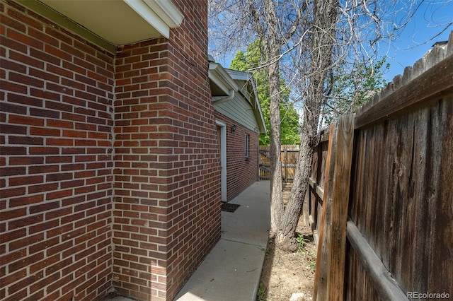 2120 S Ouray St, Aurora, CO 80013 - view of side of property featuring brick siding