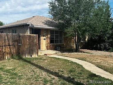 exterior space with a lawn