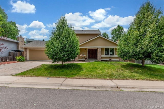 7762 W Ottawa Pl, Littleton, CO 80128 - view of property hidden behind natural elements featuring concrete driveway