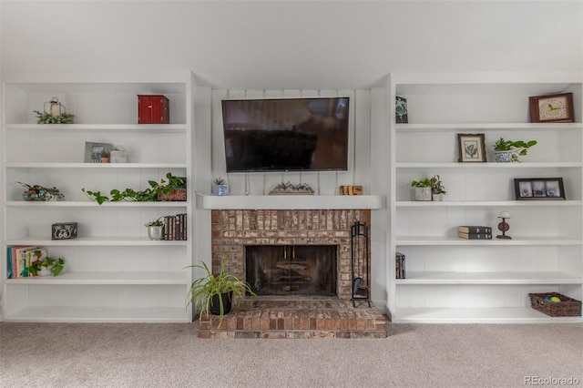 7762 W Ottawa Pl, Littleton, CO 80128 - carpeted living area with a fireplace