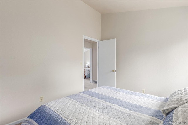 7762 W Ottawa Pl, Littleton, CO 80128 - bedroom featuring baseboards and light carpet