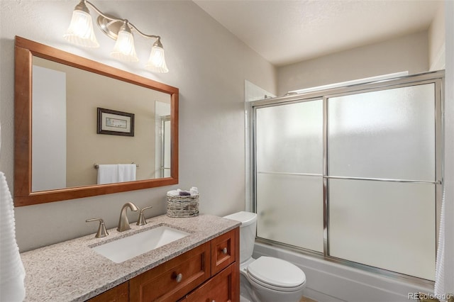 7762 W Ottawa Pl, Littleton, CO 80128 - full bathroom with vanity and enclosed tub / shower combo