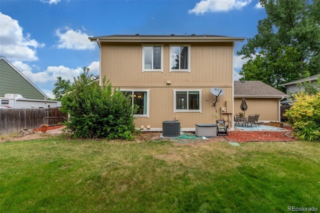 7762 W Ottawa Pl, Littleton, CO 80128 - back of property with a patio area
