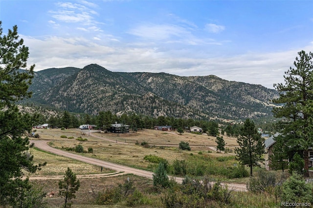 property view of mountains featuring a rural view