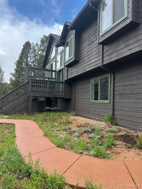 4041 Trout Creed Rd, Woodland Park, CO 80863 - view of side of home featuring a wooden deck