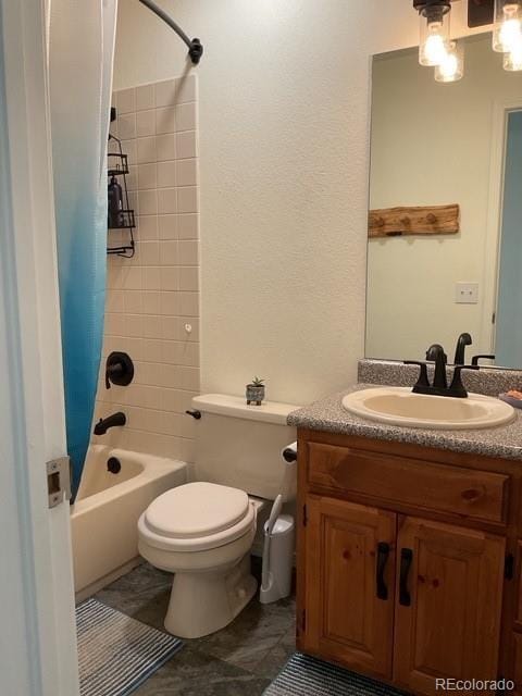 4041 Trout Creed Rd, Woodland Park, CO 80863 - bathroom featuring toilet, vanity, and shower / bath combo with shower curtain