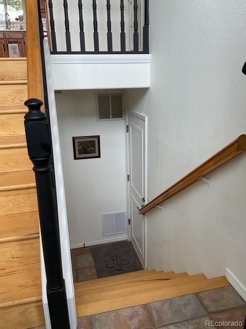 4041 Trout Creed Rd, Woodland Park, CO 80863 - stairs with baseboards