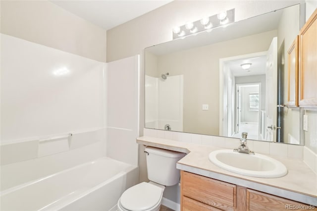 full bathroom with vanity, bathing tub / shower combination, and toilet