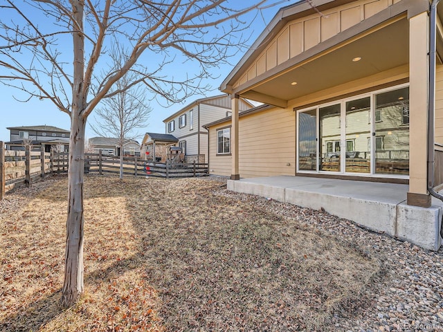 view of yard with a patio area and a fenced backyard