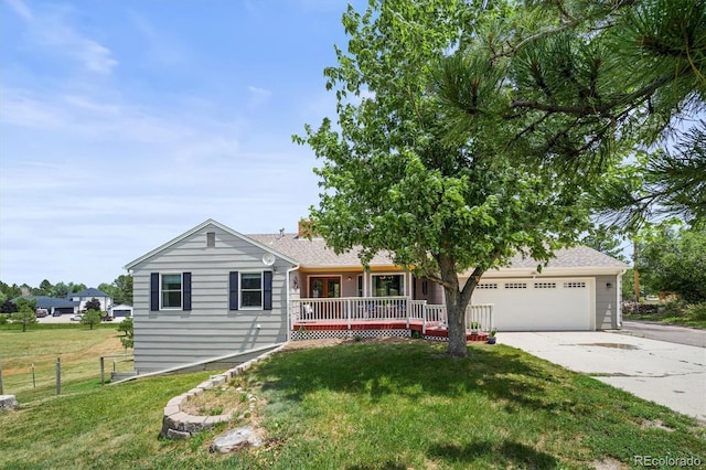 1233 Starling Ln, Elizabeth, CO 80107 - ranch-style house featuring concrete driveway, a garage, and a porch