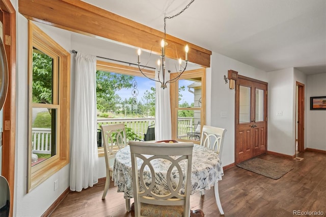 1233 Starling Ln, Elizabeth, CO 80107 - dining room with a chandelier and dark wood-type flooring