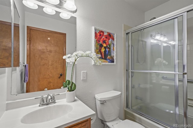1233 Starling Ln, Elizabeth, CO 80107 - full bath featuring vanity, a textured wall, and shower / bath combination with glass door