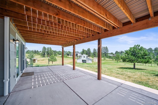 1233 Starling Ln, Elizabeth, CO 80107 - view of patio / terrace with view of wooded area