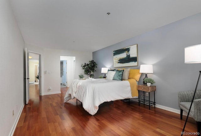 315 Arapahoe Ave Unit 202, Boulder, CO 80302 - bedroom featuring wood finished floors and baseboards