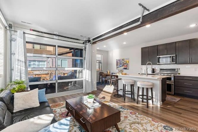 living room featuring dark hardwood / wood-style floors