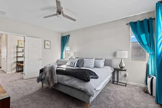 bedroom featuring ceiling fan and carpet flooring